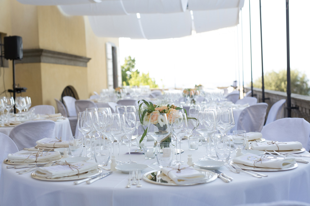 setting up the location for a wedding lunch in an ancient Tuscan villa